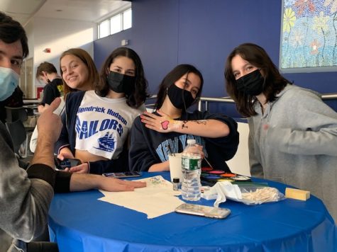Students enjoying the face-painting table! (From left to right: Owen Fescoe, Ruby Sarmineto, Monica Rocha, Sarah Mason, and Hayden Bouza)