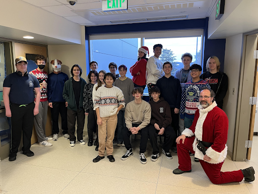 From left to right: Max Cannon, Bixby Piccolo-Hill, Hamster, Francisco Aguirre-Ghiso, Aidan Schneider, Kacie Burns, Castalia Litos, Sarah Nabi, Elia Lezlinger, Elaine Clarke, Jericho Shea, Hayden Bouza, Zach Zalamea, Miles Eichenholtz, Simon Eichenholtz, John May, Mikhael Mani, Santa Claus, Tyler McGuigan

Photo Credit: Stephen Raguso
