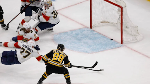 Number 88 David Pastrnak scores on a wide open net six minutes into Game 1 on Monday night - Boston.com
