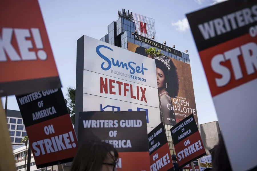 Strikers marching outside Netflix offices. Photo Credit: Vanity Fair